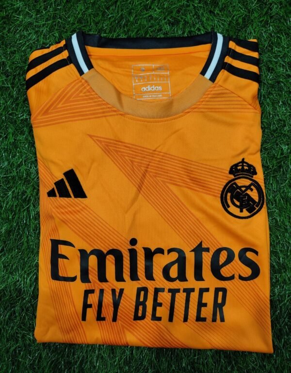 Real Madrid Fly Emirates Orange Football Jersey - Fan Edition