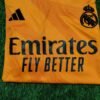 Real Madrid Fly Emirates Orange Football Jersey - Fan Edition