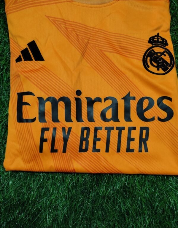 Real Madrid Fly Emirates Orange Football Jersey - Fan Edition