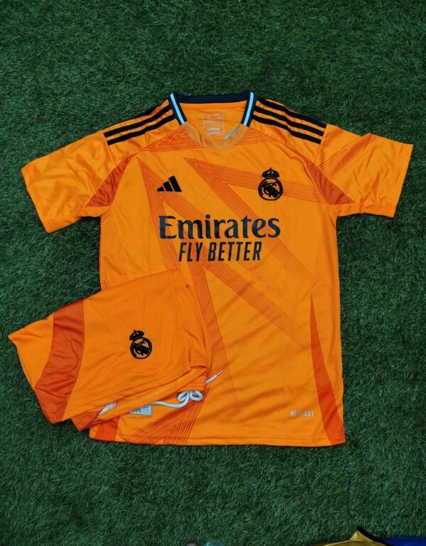 Real Madrid Fly Emirates Orange Football Jersey - Fan Edition